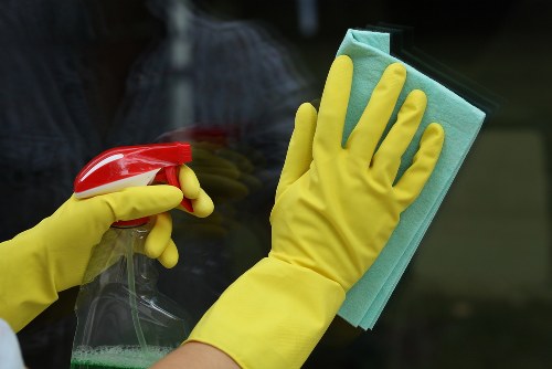 Carpet cleaning team preparing equipment with safety gear in a Crofton Park property