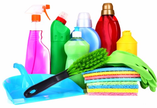 Carpet cleaning technician preparing service equipment