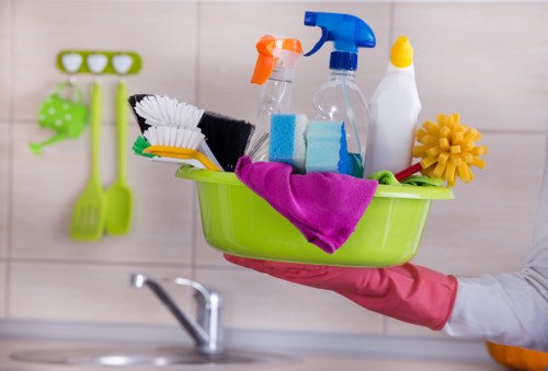 Carpet cleaner preparing equipment safely before a cleaning job